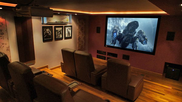 The home cinema features a 92" screen and seating for six.