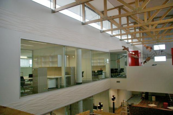 The interior of the building uses glass to maximize the use of natural light.