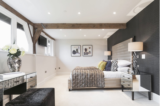 The master bedroom, where blinds and lights follow the mood settings in the room.