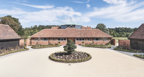 Astor Barn, the last of seven restored barns that originally formed part of the Model Farm built by Lord Astor of the Cliveden Estate, Berkshire.