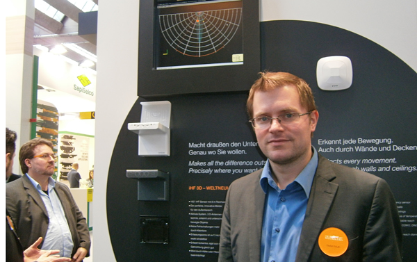 Stefan Muth of Steinel shows the company's high-frequency presence detector, due for release in 2015.
