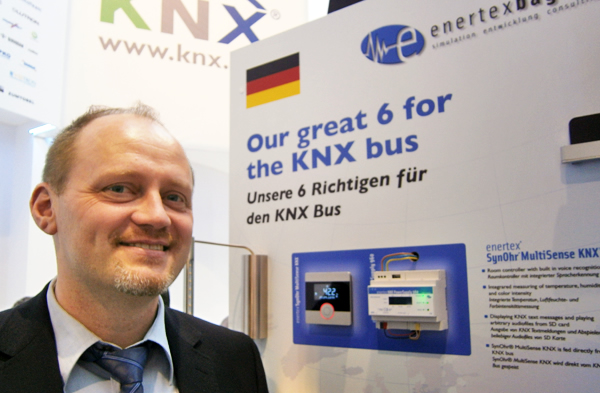 Michael Schuster from enertex demonstrates the SynOhr controller and touch-sensitive panel.