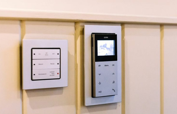 Gira panels for door communication and lighting control.