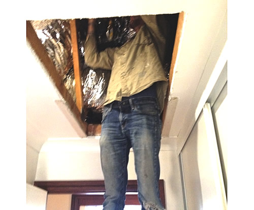 Working in ceiling voids has health and safety implications.