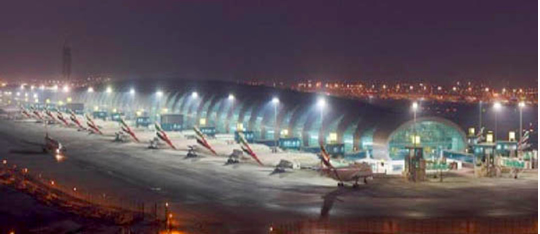 KNX Awarded project at Dubai Airport Concourse 3, exterior view in the night with lighting.