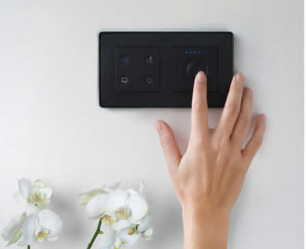 Simon Sense switches generate haptic feedback through vibration and colour LEDs.