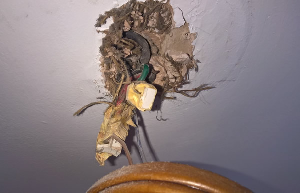 Investigating old fittings reveals why a rewire should be considered.