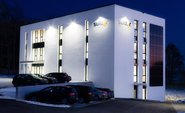 The Sulzer building at night, illuminated with LED spotlights.system that controls all areas of the Sulzer administration building. 