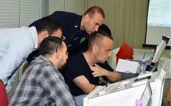 Christophe Lavergne (right) of KNX USA helping with a training session organised by CFEA in Algiers.