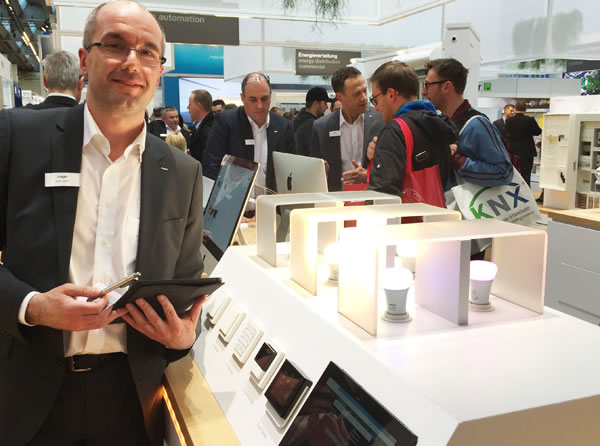 Hager's Sven Lübeck demonstrating the Hager IoT software alongside the Philips Hue.