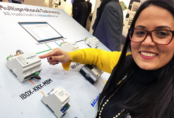 Intesis' Maria Elena Cabello pointing out the IntesisBox ModBus to KNX gateway.