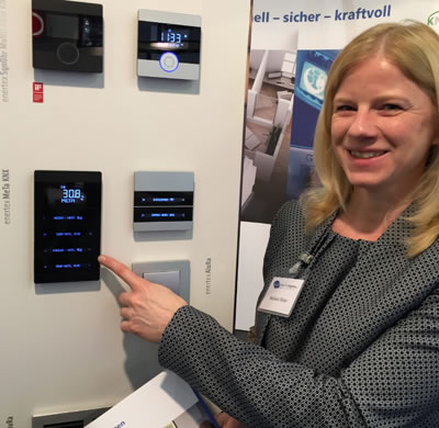 Enertex Bayern's Production, Sales and Support Manager, Stefanie Meier, demonstrate the SynOhr and MeTaKNX touchpanels.