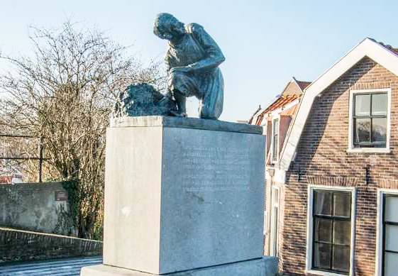 Monument in Spaarndam, the Netherlands, created in 1950, which reads, 'Dedicated to our youth to honour the boy who symbolises the perpetual struggle of the Netherlands against the water' (transl).