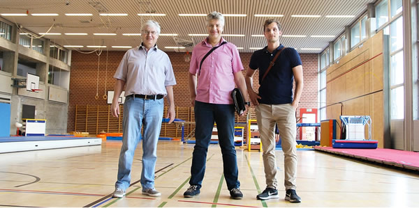 In the double sports hall are (left to right) Franco A. Bonutto of Soltris Gebäudesystemtechnik; Christian Blumer, Account Manager ABB; and Matthias Matter, Business Development Smart Buildings ABB.