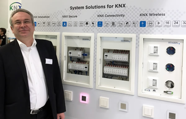 CEO of Weinzierl Engineering, Thomas Weinzierl, showing the latest dimmers and KNX IP Secure devices.