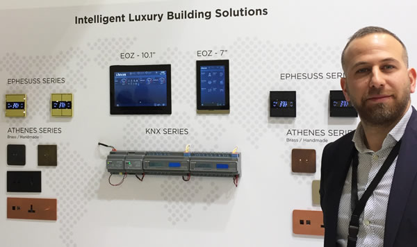 iluxus Sales Manager Cüneyt Sismangolu presenting a range of KNX modules, switches, sockets, room controllers and touchpanels.