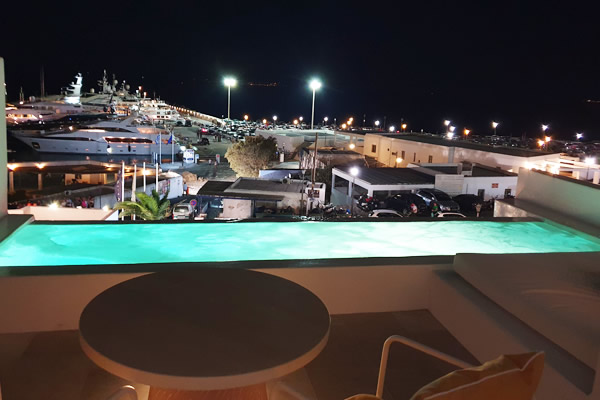 Balcony view over pool and harbour.